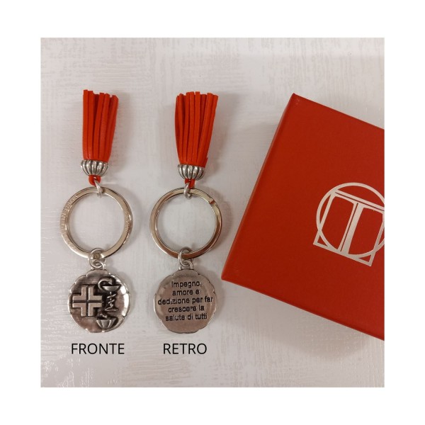 P/chiavi in ottone bagno argento LAUREA FARMACIA con nappa in similpelle e scatola DIAM.2,5 CM il ciondolo.MADE IN ITALY
