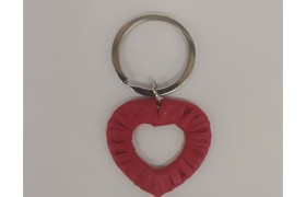 P/chiavi cuore in metallo e raffia rossa.MIS.2,5X4CM