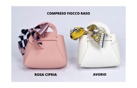 Borsetta in similpelle con fiocco in tessuto fantasia.MIS.12X6 H13 (manico compreso)