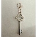 Ciondolo metallo,chiave con strass e moschettone.H2,5CM