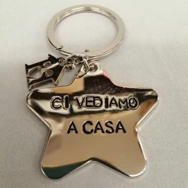 P/chiavi acciaio stella con scritta.MIS 4,2X4,2CM