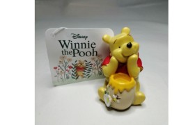 Winnie the Pooh in poliresina .H5,5CM