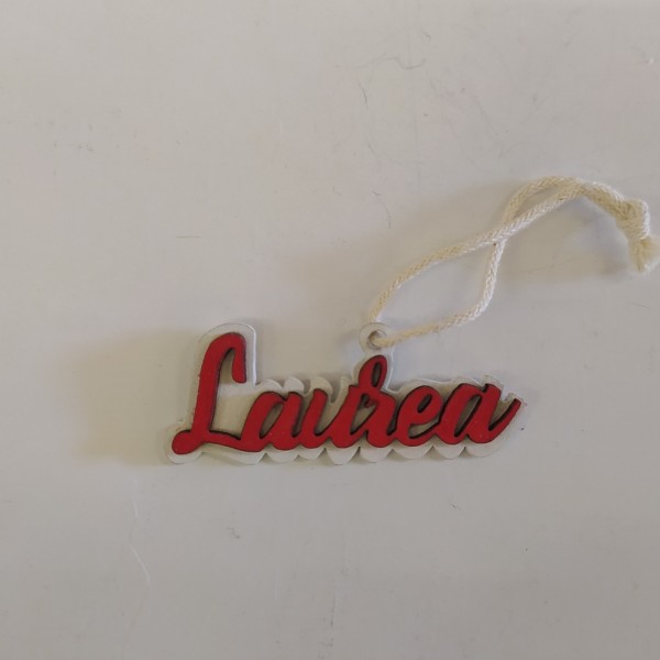 Applicazione legno LAUREA su base bianca con cordino.MIS.5,5X1,5CM circa