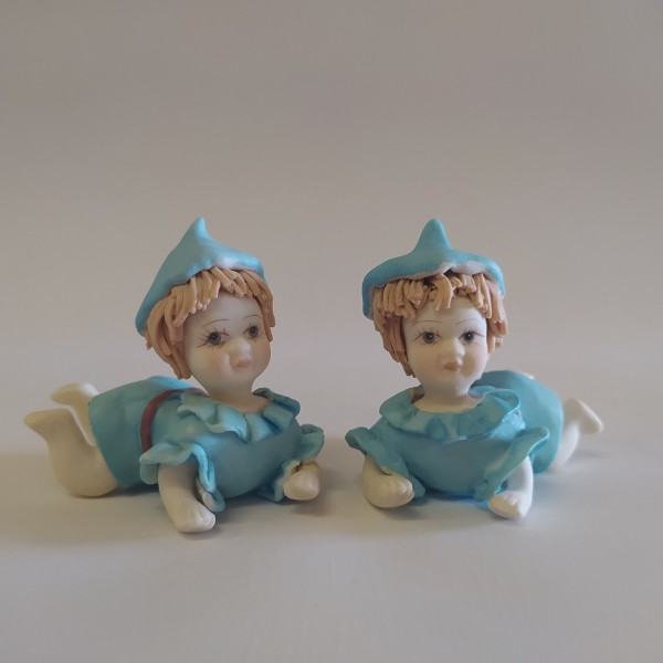 Bimbo in porcellana azzurro.MIS.8X H6CM