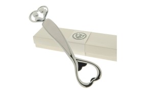 Apribottiglie metallo e bianco con coppia,scatola compresa.CM19