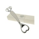 Apribottiglie metallo e bianco con coppia,scatola compresa.CM19