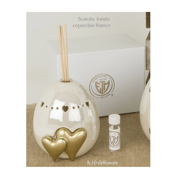 Diffusore uovo di ceramica perlata.Compreso di scatola ,bastoncini e profumo. H 10 cm