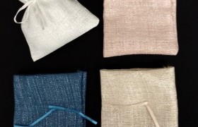 Sacchetto trama misto lurex con tirante. CM 10x13