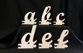 Lettere di legno in corsivo minuscolo. H 12x12