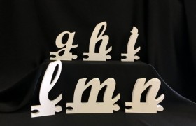 Lettere di legno corsivo minuscolo. H 12x12