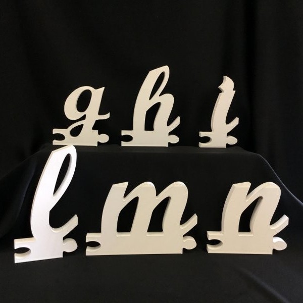 Lettere di legno corsivo minuscolo. H 12x12
