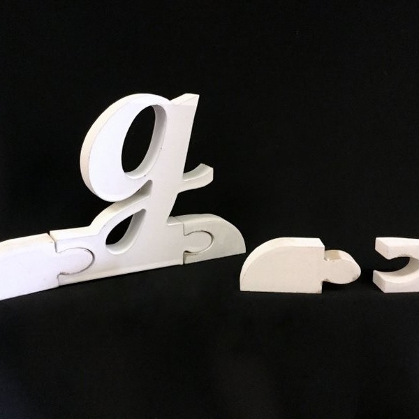 Coppia tasselli in legno,incastro a puzzle, per lettere maiuscole e minuscole. CM 5x2 H 3 (singolo)