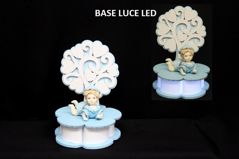 Albero legno con base luce LED e bimbo ceramica con scatola. Diam. 12 H 17