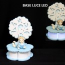 Albero legno con base luce LED e bimbo ceramica con scatola. Diam. 12 H 17
