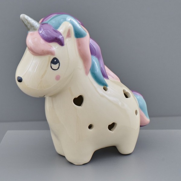 Unicorno in ceramica, colore perlescente e luci LED. CM 15x7.5 H 15.5