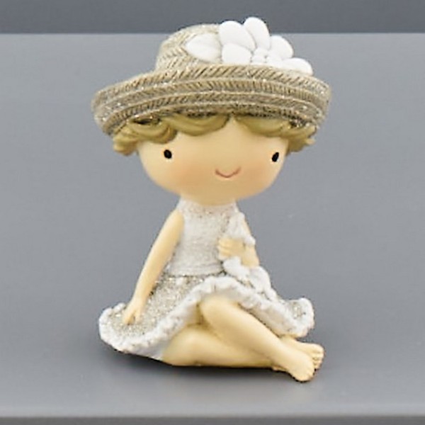 Bimba in resina seduta con dettagli glitter. CM 4x4 H 5.5
