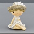 Bimba in resina seduta con dettagli glitter. CM 4x4 H 5.5