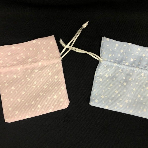 Sacchetto tessuto con stampa stelline. CM 10x9