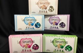 Nocciola ricoperta di cioccolato aromatizzato a 4 gusti, colori sfumati. KG 1