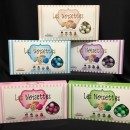 Nocciola ricoperta di cioccolato aromatizzato a 4 gusti, colori sfumati. KG 1