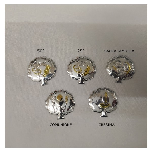 Placca laminato arg con immagini varie. CM 3.5x3.5