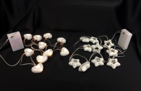 Filo con 10 luci LED in ceramica. Luce fissa o intermittente. CM 4.5/5 (stella o cuore)
