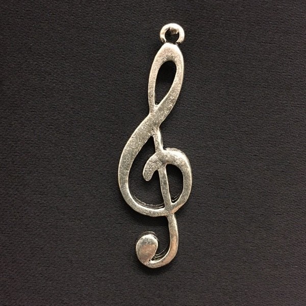 Ciondolo metallo zama, chiave di violino. CM 4.5