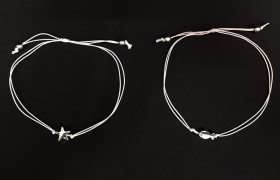 Bracciale doppio filo con ciondolo passante, nodo scorsoio.