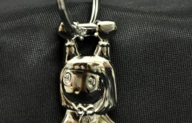 Portachiavi metallo con bimba