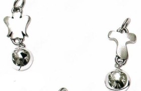 Ciondolo in ottone con bagno argento con campanellino. CM 4.5 circa. MADE IN ITALY