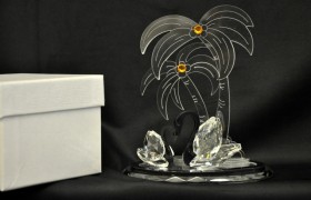 Coppia di cigni in cristallo con palme in plexi 13x8.5 H 15 con scatola