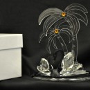 Coppia di cigni in cristallo con palme in plexi 13x8.5 H 15 con scatola