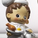 Baby chef in resina salvadanaio L.10 H 18