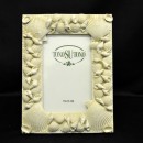 Cornice resina con conchiglie 10x15