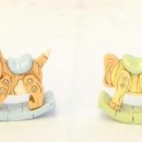 Animaletti in resina anticata tipo legno su dondolo cm.5 ass. 4