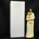 Coppia con bimbo in resina tipo legno H 30 con scatola