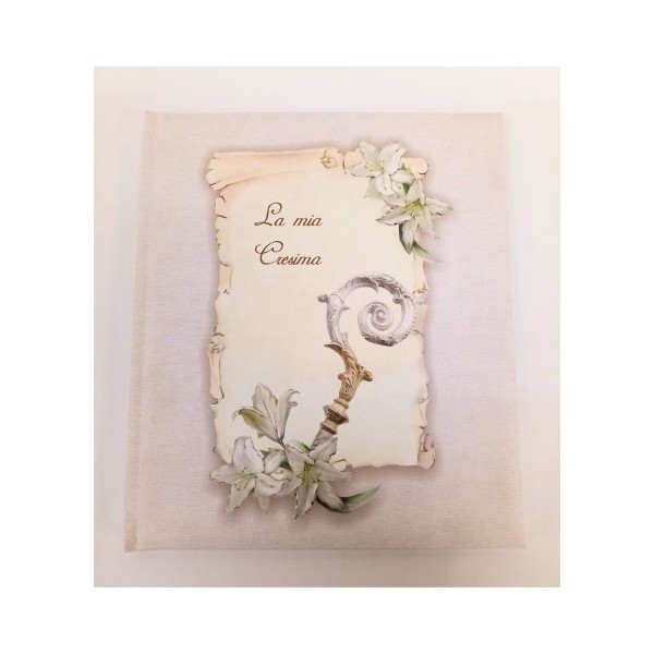 Album da 20 pagine con copertina tela. CM 23x27. Scatola regalo con manico