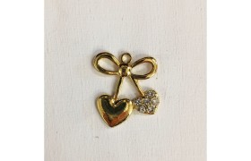 Applicazione forma fiocco con cuore oro . H 4