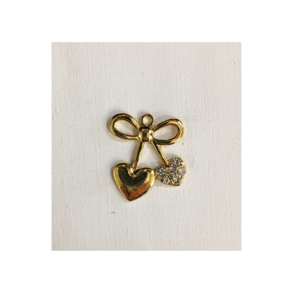 Applicazione forma fiocco con cuore oro . H 4