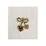 Applicazione forma fiocco con cuore oro . H 4